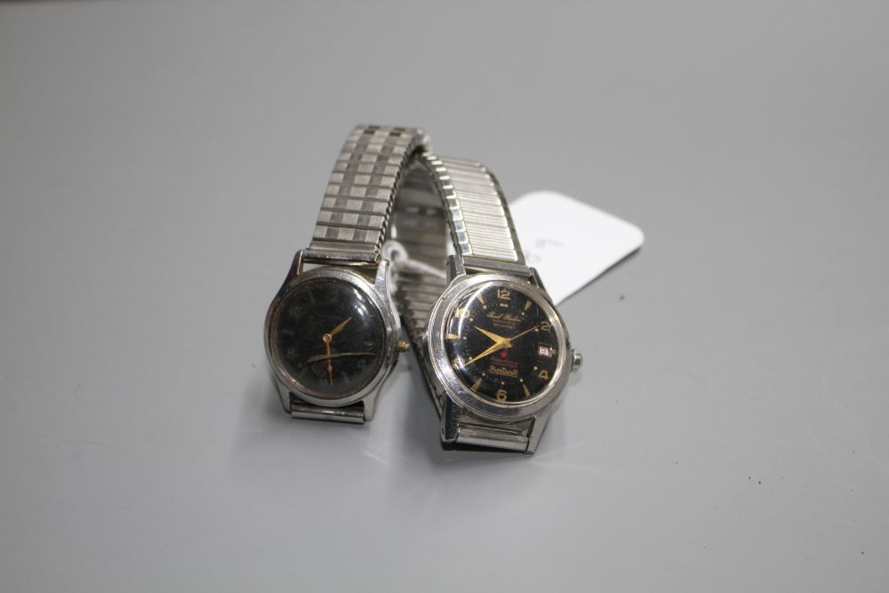 Two gentlemans stainless steel black dial wrist watches including automatic and Universal(a.f.).